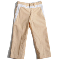 The Frank Golf Pants from Tia Cibani. Loose fit straight leg pants. Contrasting color ribbon detail under belt loops.