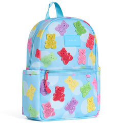 State Bags Kane Mini Backpack in light blue with colorful 3D gummy bear patches and logo patch