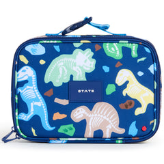 State Bags Rodgers Lunch Box in blue with dinosaur skeleton print, zip closure, and STATE logo patch