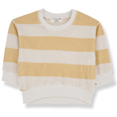The Stefano Sweater from 1+ in the Family. A cozy and stylish baby sweater with wide peach and off-white stripes.