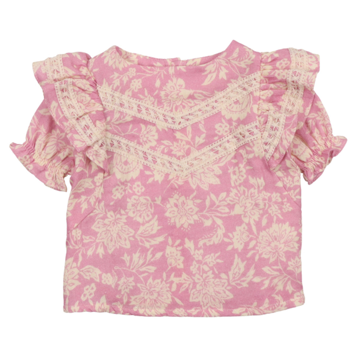 The Santa Clarita Baby Blouse from The New Society. This blouse features a distinctive, one-of-a-kind print