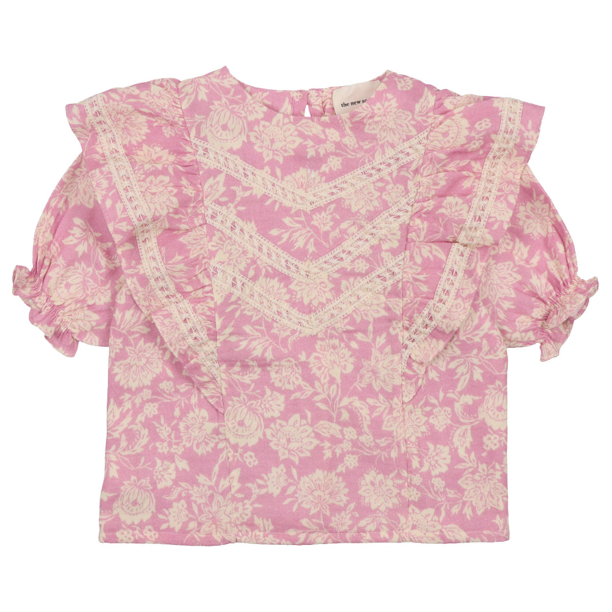 The Santa Clarita Blouse from The New Society. This blouse features a distinctive, one-of-a-kind print