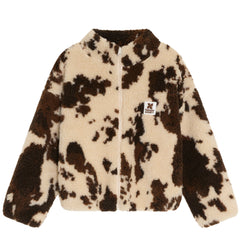 The Wynn Jacket by The New Society in soft sherpa fleece with brown cow print, full-zip front and stand collar.