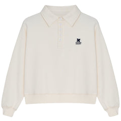 TNS Logo Teen Polo from Molo in ecru with long sleeves, button placket, classic collar, and small embroidered logo