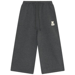 The TNS Logo Jogging Pants from The New Society, wide-leg joggers with drawstring waist and logo print.