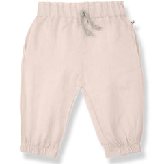 The Uxia Pants from 1+ in the Family. These baby pants feature an elastic waistband with an adjustable drawstring.