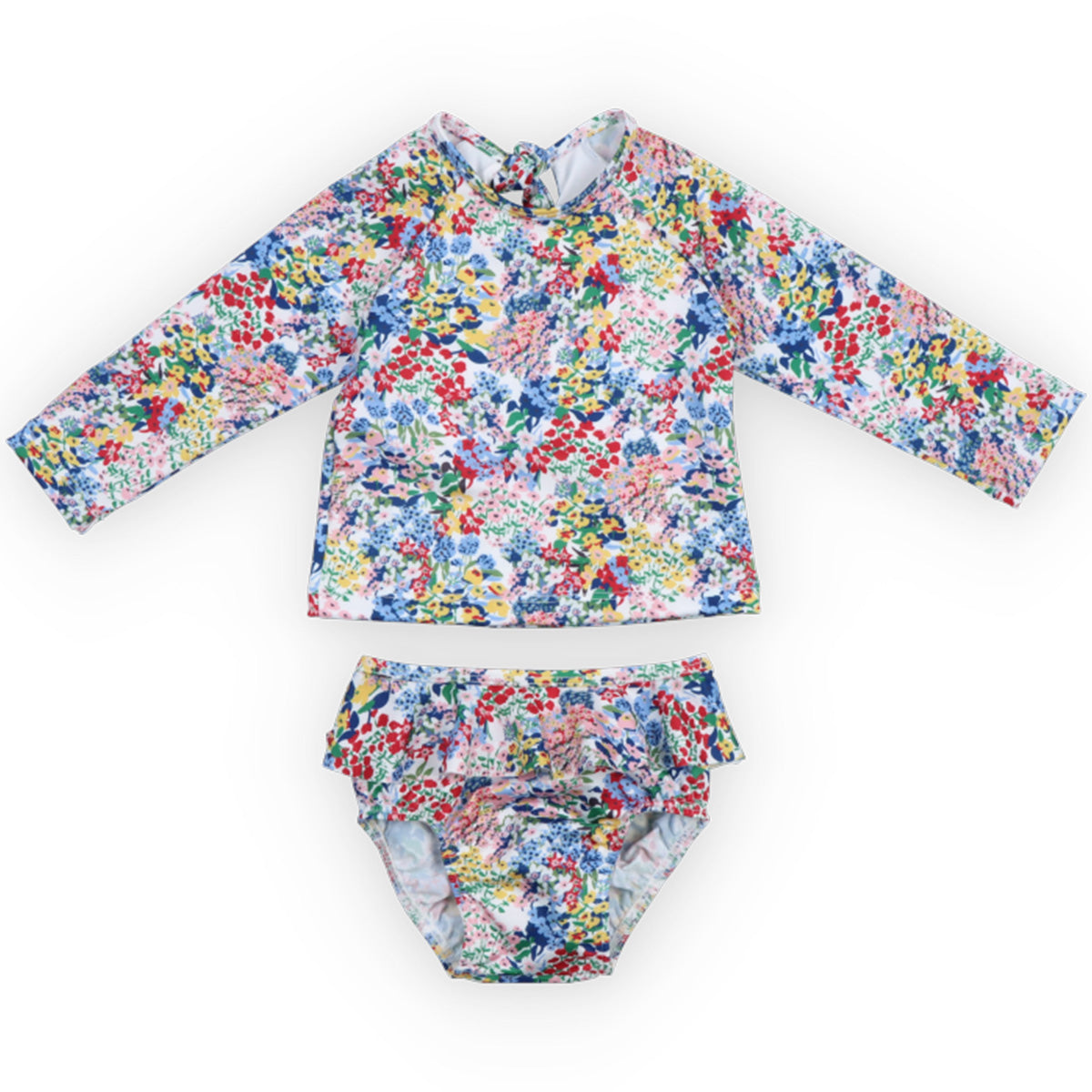Verbena Baby Swimsuit from The New Society with long-sleeve top and ruffled bottoms in colourful floral print