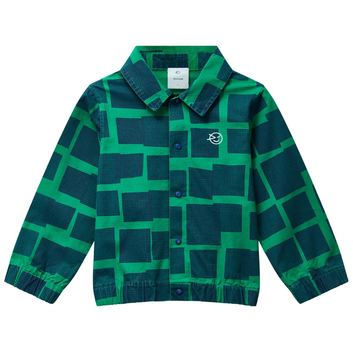 The Camp Jacket from Wynken. The bold kite block print brings a playful, colorful vibe that’s sure to stand out.