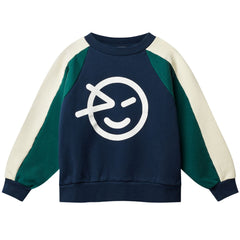 Wynk Panel Sweatshirt by Wynken.  Navy blue sweatshirt with green and beige sleeves and a white smiley face.