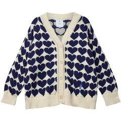 The The Lovers Cardigan from Wynken. Cardigan with blue heart pattern on a white background.