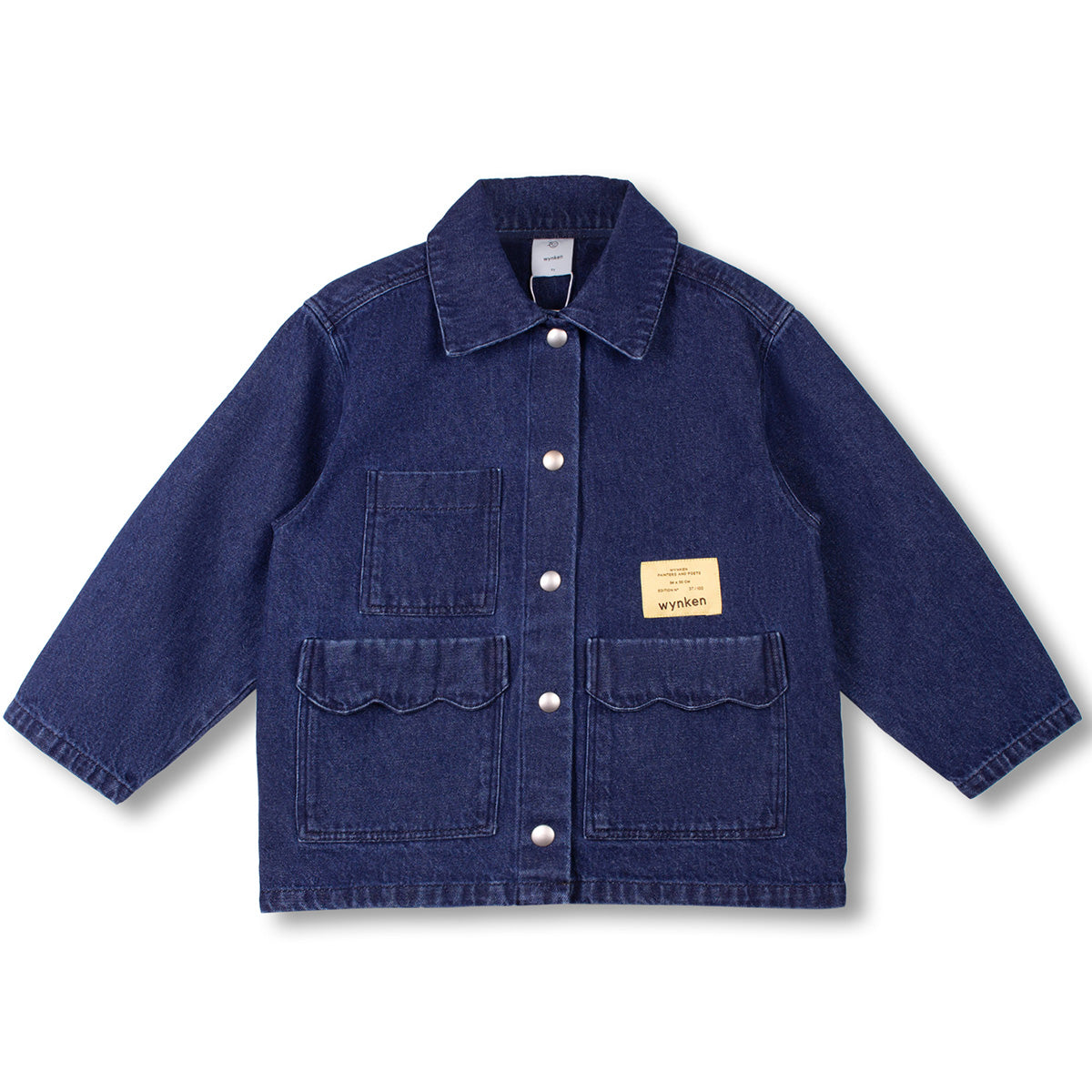 The Scallop Jacket from Wynken, denim jacket with snap buttons, scalloped patch pockets, and chest pocket.