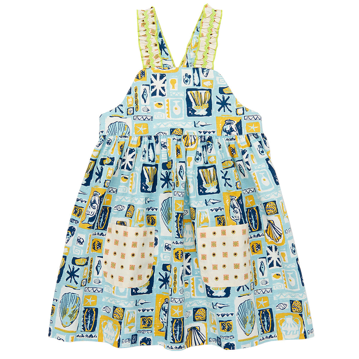 The Willa Dress from Misha & Puff. A new dress in cotton poplin, with a high waist and gathered bib, contrast print ruffle straps.