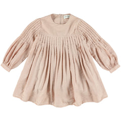 Yndia Dress by Morley. This pale rose dress features a round neckline, pleated bodice, and voluminous long sleeves.