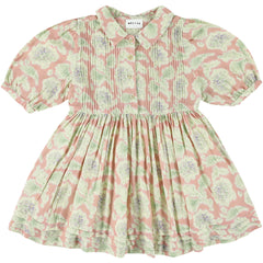 The Yrma Dress from Morley. This floral dress in soft rose features a classic collar, button front, and pintuck detailing.