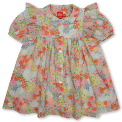 The Delicia Dress from Oilily. It has a Peter Pan collar, puffed sleeves with extra ruffles and a lush wide fit
