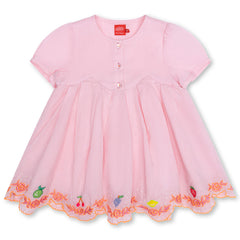 The Desia Dress from Oilily. Featuring a soft, flowy silhouette, short sleeves, and a buttoned front.