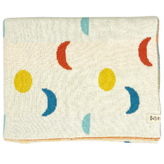 Moon Phases Blanket by Bayiri. This is a knitted baby blanket decorated with colorful moon and circle motifs.
