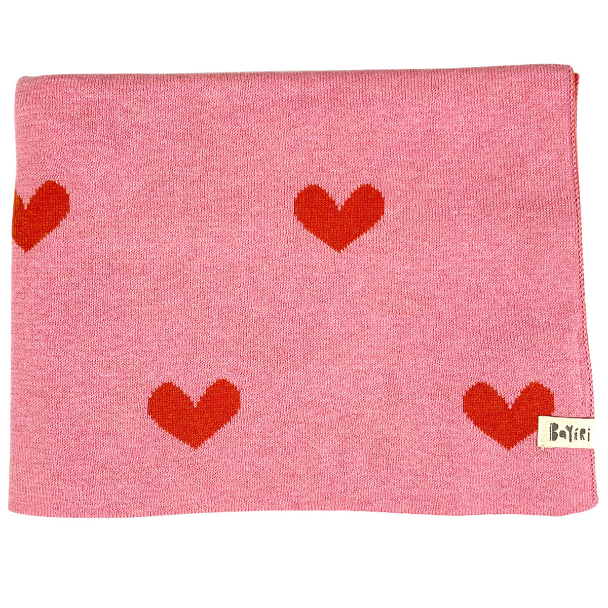 The Moon Phases Blanket from Bayiri. This is a knitted baby blanket in soft pink, patterned with bold red hearts.