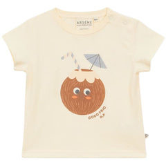 Arsene et Les Pipelettes Coconut Baby Tee, cream short-sleeve T-shirt with coconut graphic and shoulder snaps.