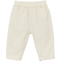 The Fine Velvet Baby Pants from Arsene et Les Pipelettes in off-white fine corduroy with scoop pockets and elastic waist.