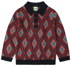 The Harlekin Polo from FUB. The polo is knitted in a graphic multi-colored jacquard pattern.