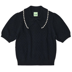 The Pointelle Polo from FUB. It has a regular fit, a bow collar with a contrast color lace edge, and ribbed hems.