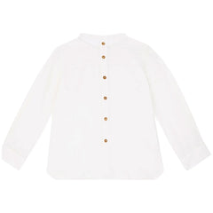 The Light Blue Woven Shirt from Zhoe &amp; Tobiah. Light blue long-sleeve shirt with brown buttons.