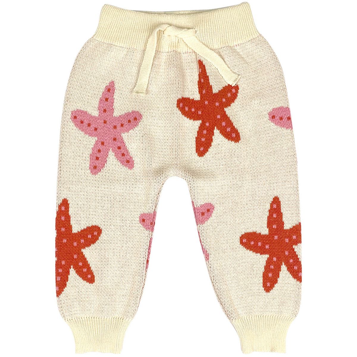 Starfish Dance Pants by Bayiri. Baby knitted pants in a cream base, featuring playful starfish motifs in pink and red.