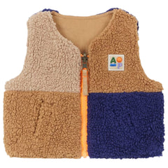 The Reversible Sherpa Baby Vest from Arsene et Les Pipelettes in color-blocked sherpa fleece with a zip front and AP patch.