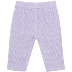 The Velvet Baby Pants from Arsene et Les Pipelettes in soft lavender ribbed corduroy velvet with an elastic waist.